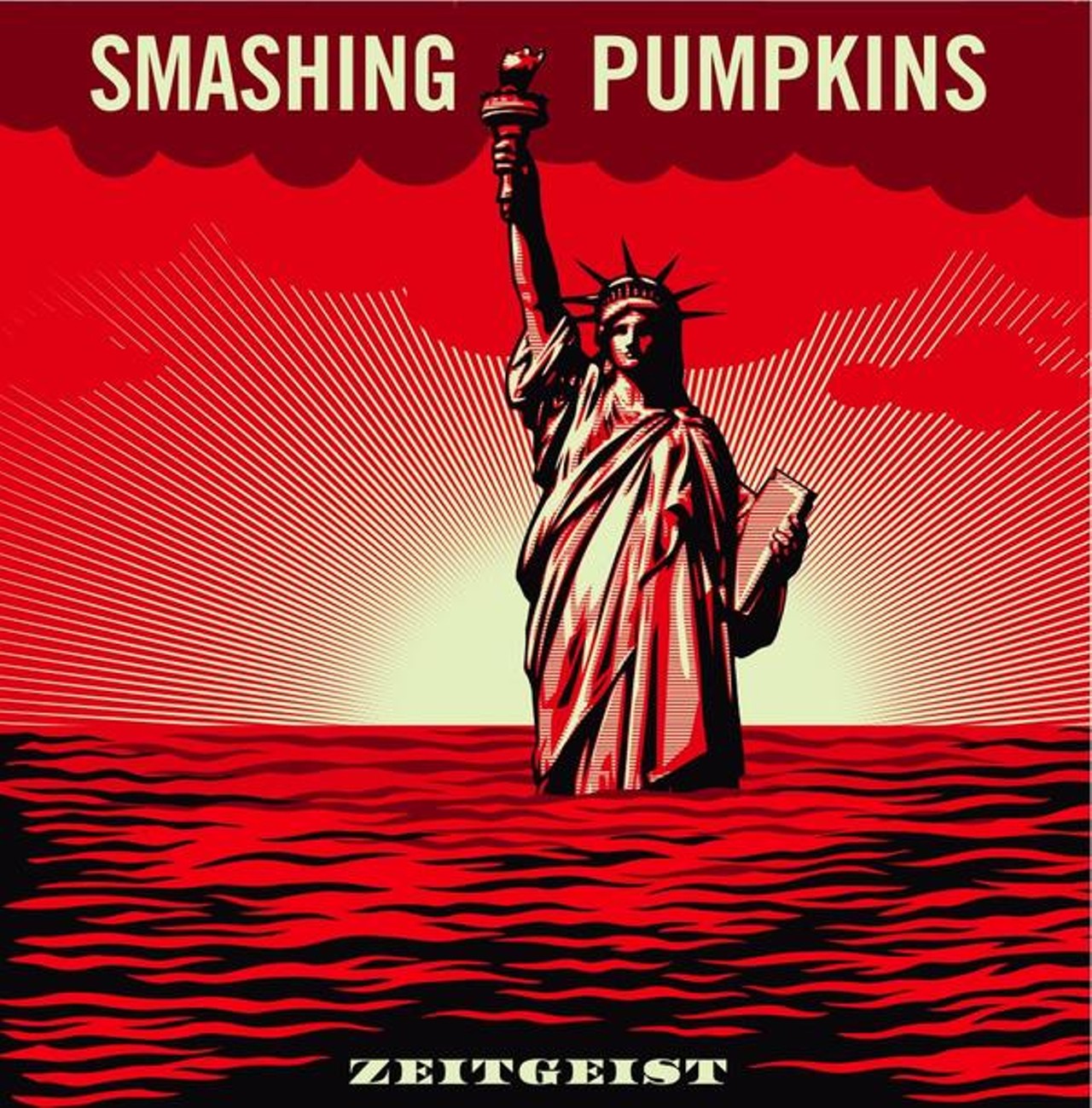 4. Smashing Pumpkins' "Zeitgeist" is plain by comparison but striking with the Statue sinking into a red sea.