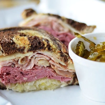 Pastrami sandwich and Fire and Ice Pickles at Dalie's Smokehouse in Valley Park