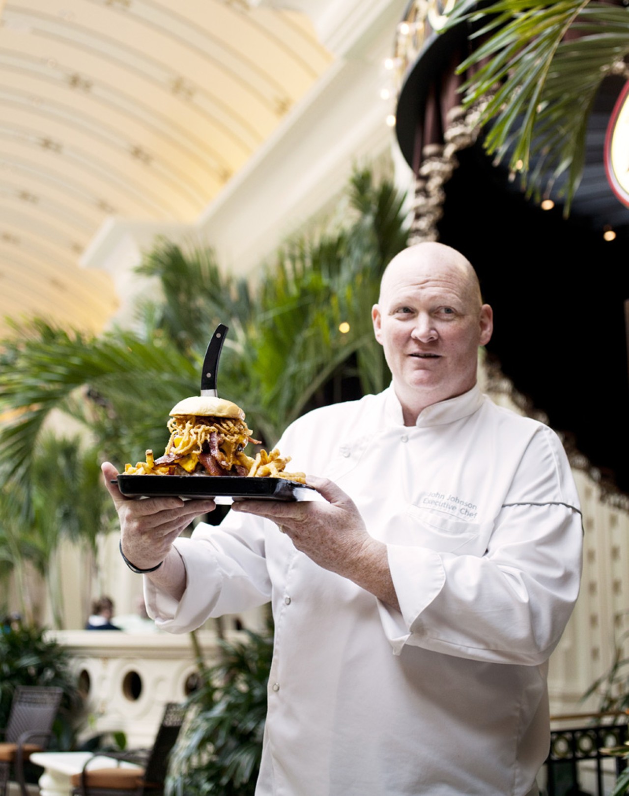 Executive Chef John Johnson oversees 10 restaurants and 2 coffee shops between River City and Lumiere Casinos. Here, he is shown holding the Triple Bypass burger.