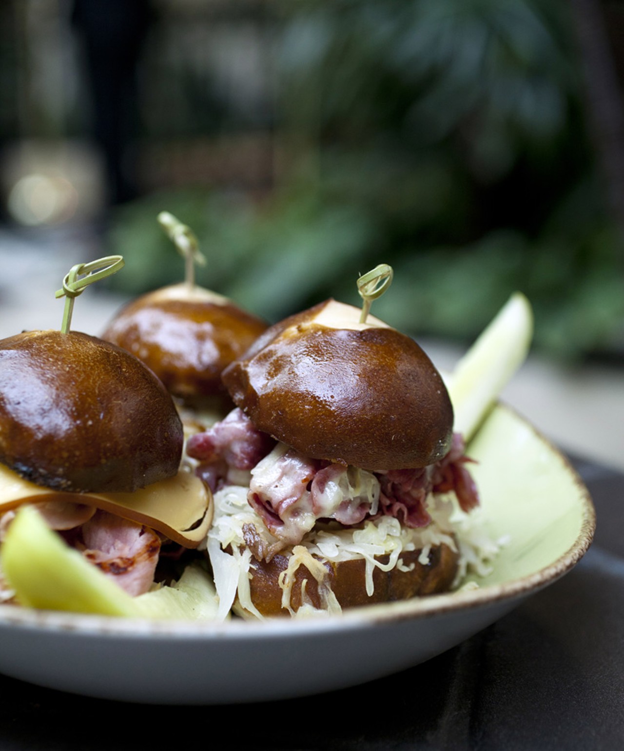 The Mini Pretzel Sliders are three "sammys" on fresh pretzel bread: thin prime rib with caramelized onions, grilled ham with gouda and purple mustard, and corned beef brisket with sauerkraut, swiss cheese and
Russian dressing.