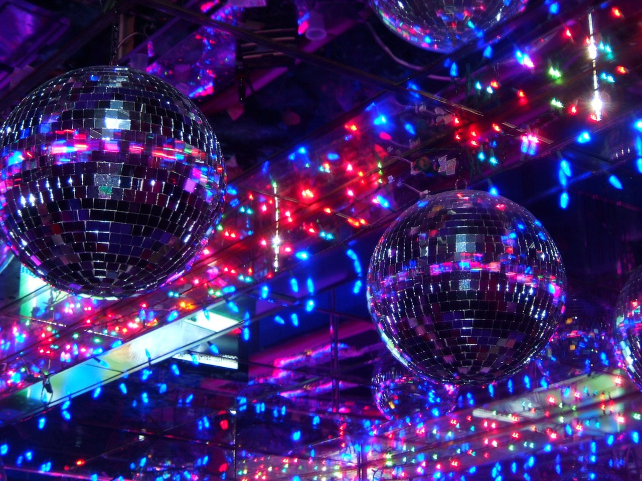 Dozens of disco balls spray pink-purple light across a dance floor worthy of its spectacle-loving, champion-jitterbug-dancing namesake, the late Mike &#147;Talayna&#148; Faille. Sing karaoke, dance and eat pizza until you stagger back into the outside world wondering what the hell happened. Photo courtesy of Flickr / J.G. Park.