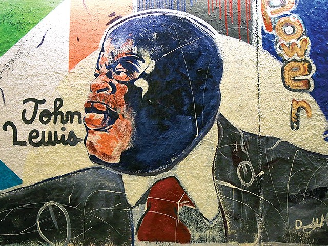 Danny McGinnist Jr.'s portrait of John Lewis was part of the mural defaced at Wash U this past weekend.