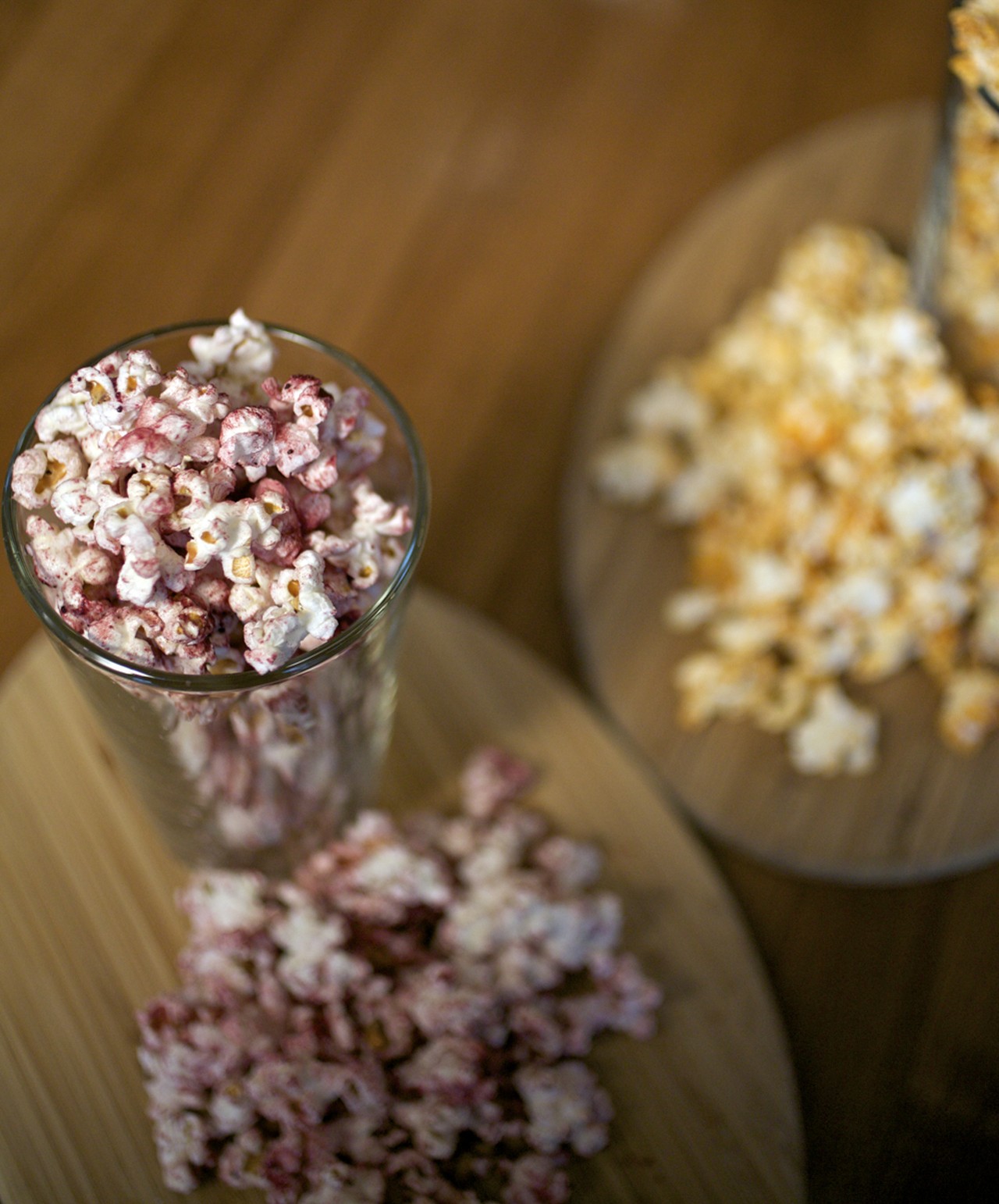 From the snack portion of the menu comes popcorn, shown here in two different varieties. First is the smoked Spanish paprika and sea salt. Then, the honey, beet powder and mustard flavored popcorn.