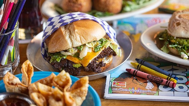 The Drawing Board’s menu is familiar, but the south-city bar impresses with high-quality versions of pub favorites. Pictured: smash burger, jambalaya balls, falafel sliders and crab Rangoon.