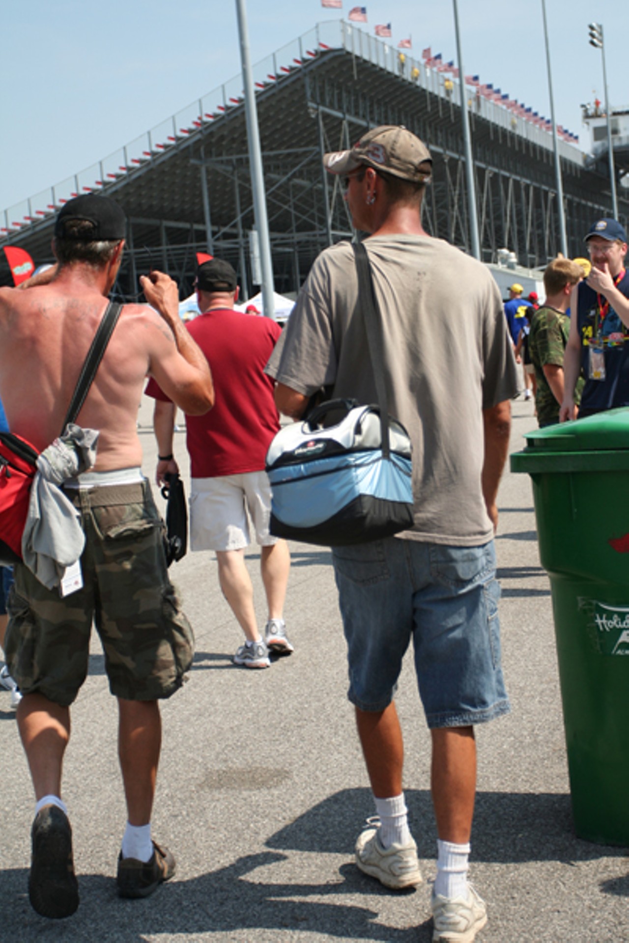 So I finally walk through the gates and I hear a beer can get tossed into the metal trashcan, the woman taking the tickets says, &ldquo;honey, you coulda brought that beer in with you.&rdquo; The Raceway is A.O.K with B.Y.O.B., which brings me to the most prominent fashion accessory of the day, the mini cooler man purse.