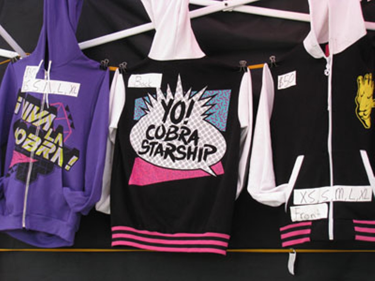 Cobra Starship merch. Nearly every band had their own table with tent advertising their name and selling wares. Only if Ed Lover and Dr. Dre could see these, they would give the boys in Cobra Starship props.