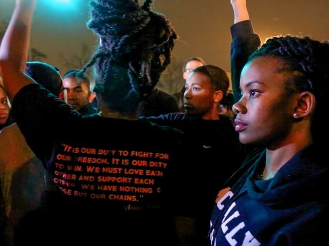 Ferguson protest leader Brittany Ferrell helped gather people together to chant, "It is our duty to fight for our freedom," during a protest in South St. Louis on Nov. 23, 2014. The chant is based on a quote by Black Power activist Assata Shakur. Before leading the chant, Activist Ashley Yates told the group, "We know Black lives matter, and we know that we must fight to prove that.”