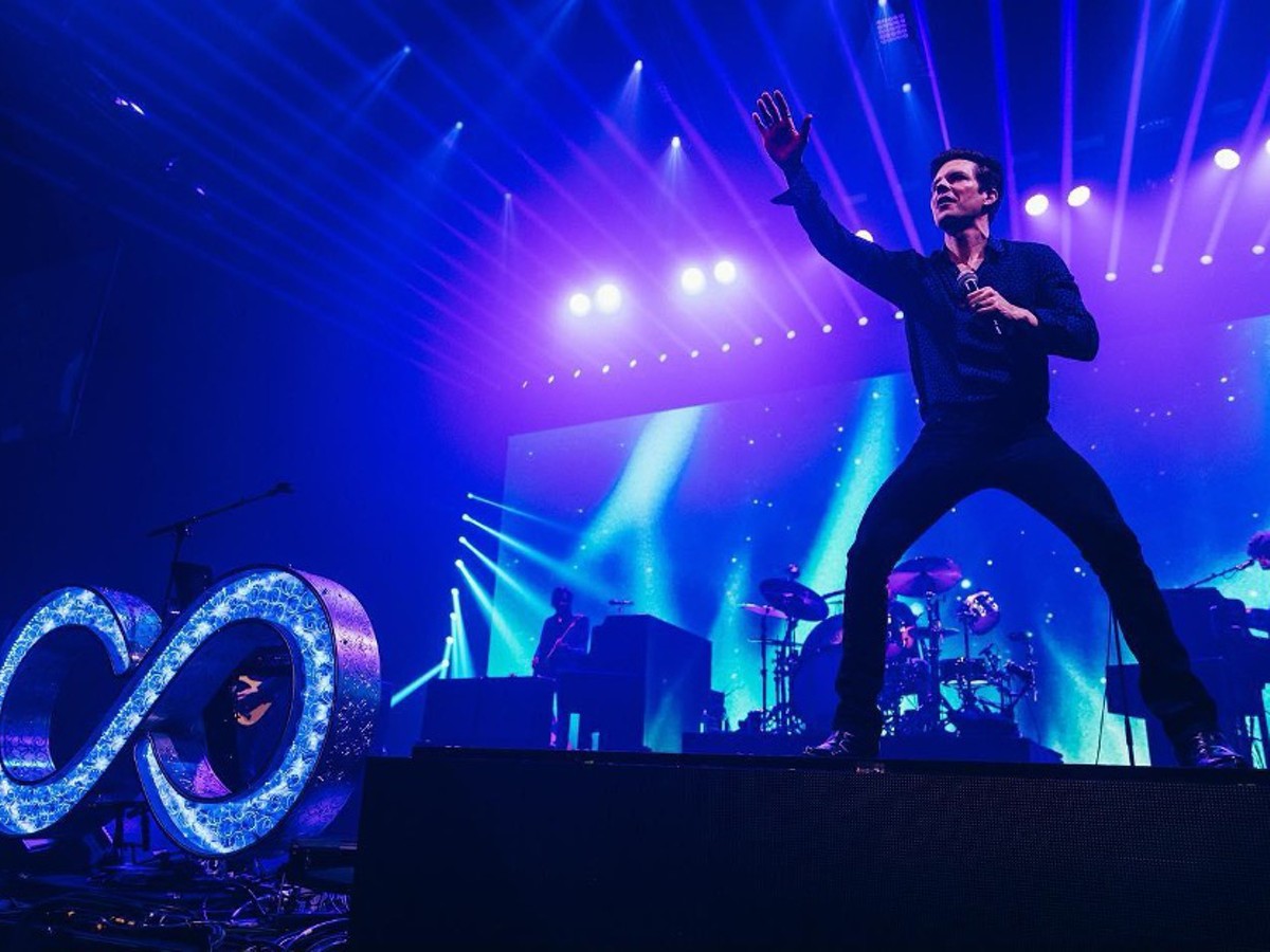 The Killers brought a packed crowd to Chaifetz Arena in March 2023. Now they'll be playing Forest Park as part of the second Evolution Festival.