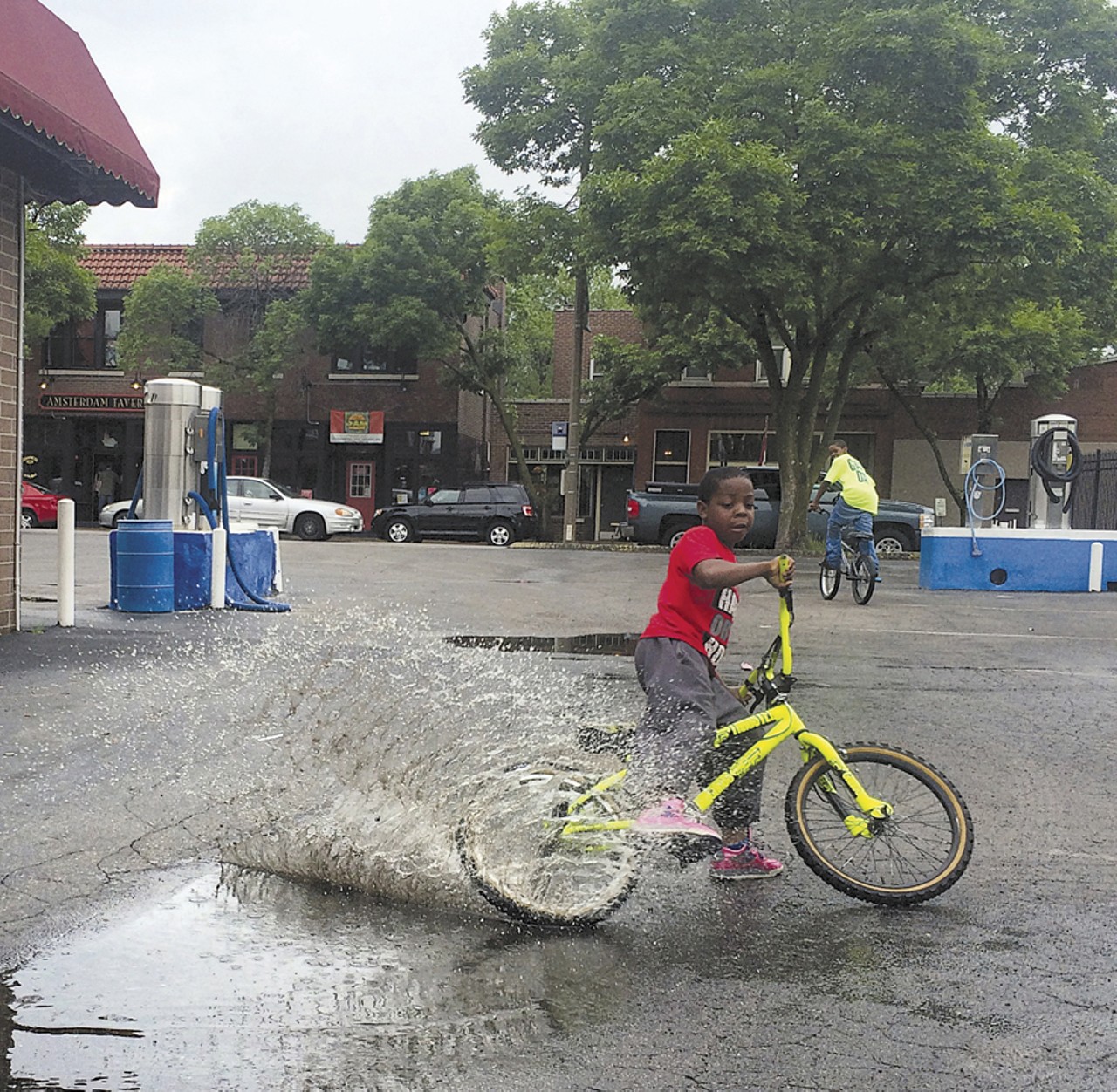 &#147;Look us up, we&#146;re called the Biking Movement.&#148; &#151; Marquis, tearing through puddles on Morgan Ford Road, May 8.