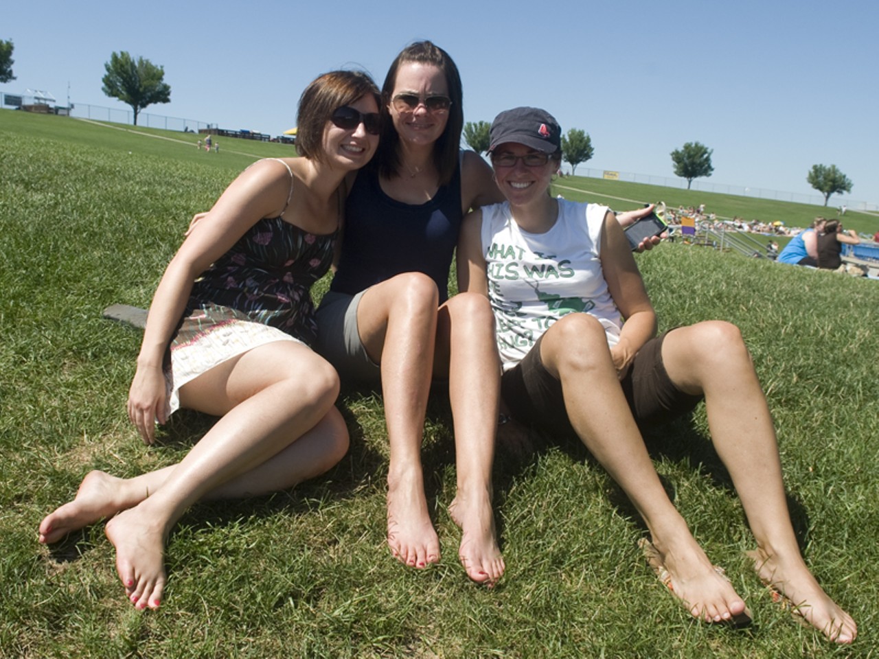Fans grab a good spot on the lawn at the Verizon Wireless Amphitheater for Lilith Fair.
