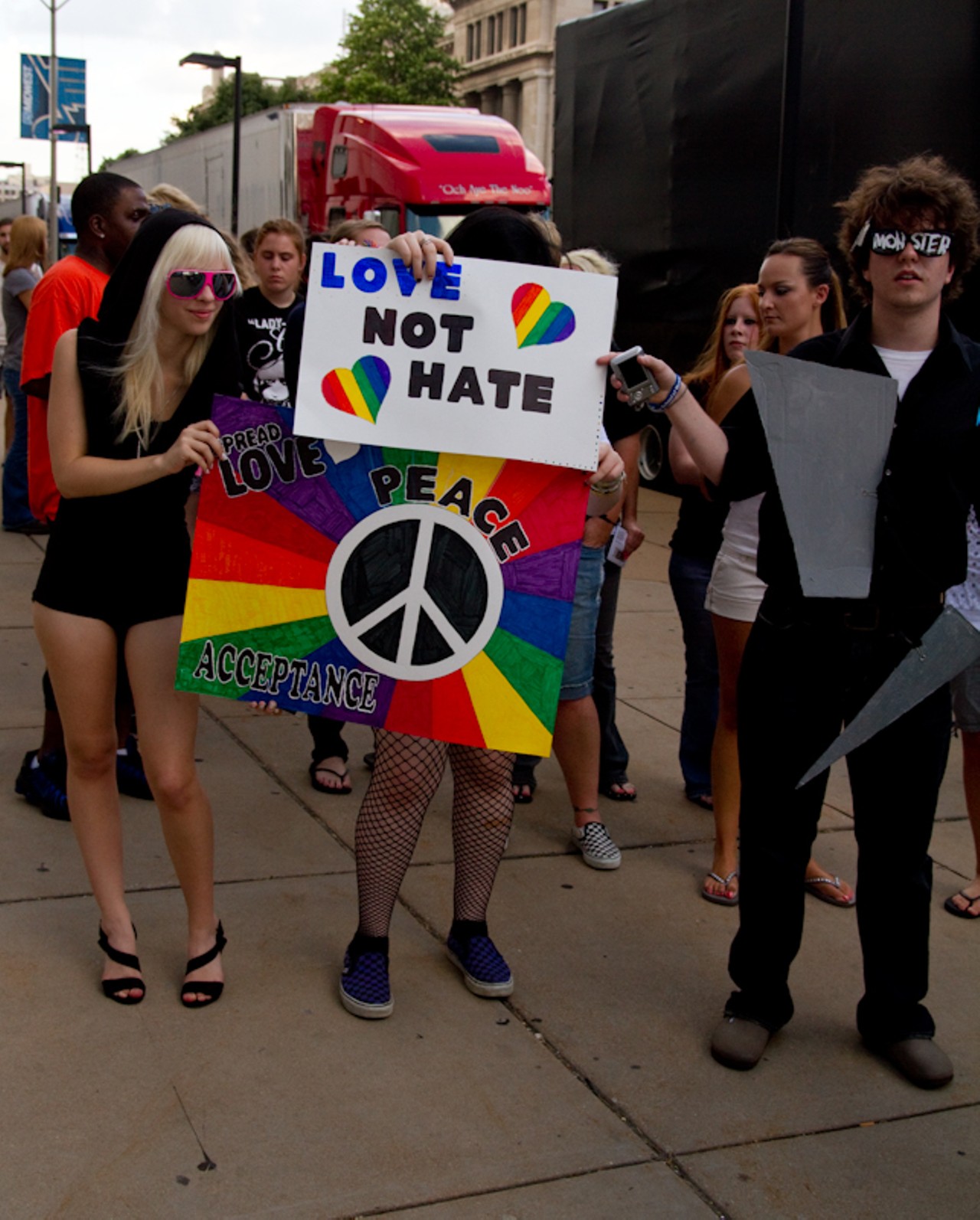 Lady Gaga's Little Monsters posing outside of the Scottrade Center in St. Louis.