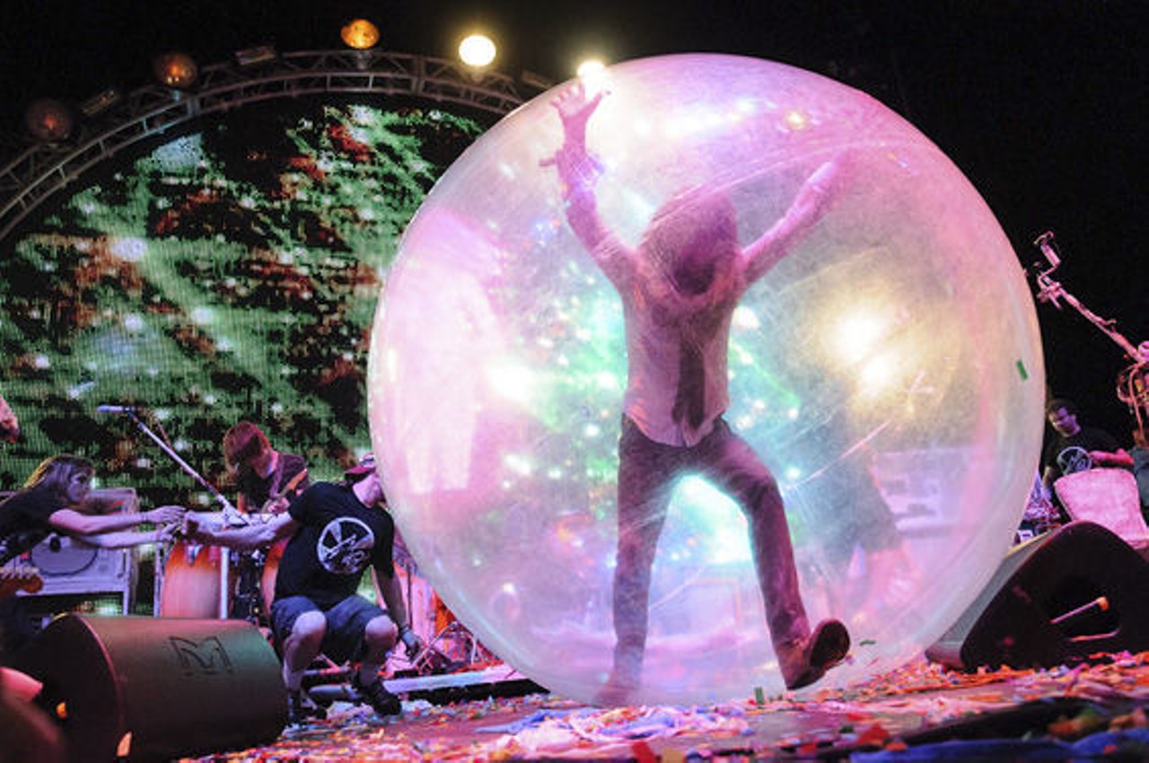 The Flaming Lips performed at LouFest 2012 on August 26, 2012. The show was visually stunning with lighting effects, enthusiastic fans and of course, human hamster balls. More Flaming Lips at LouFest photos.