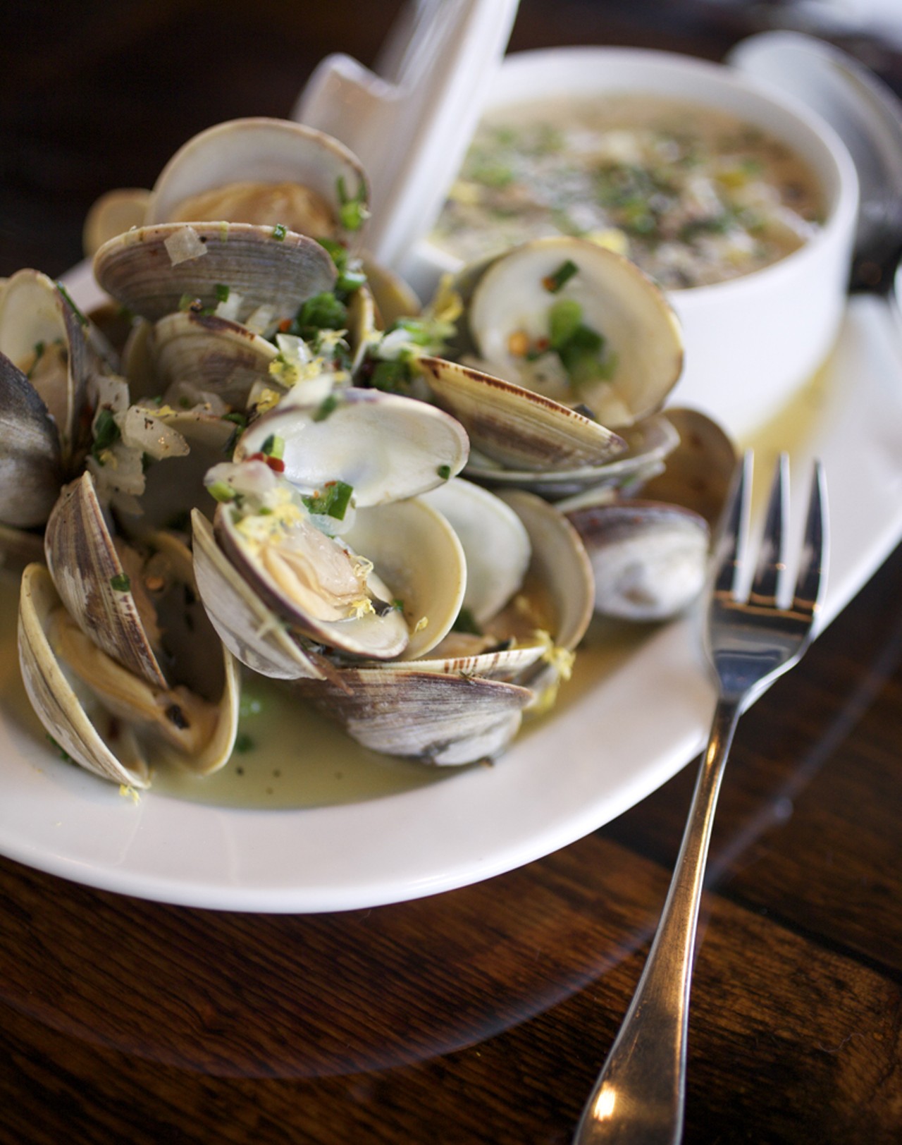 New England Clam Chowder is served along side white wine steamed clams.