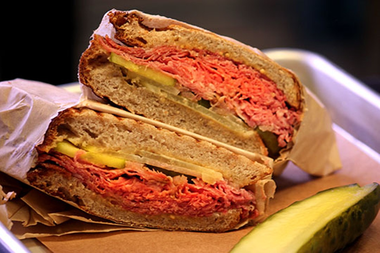 The pastrami sandwich features rye bread, pastrami, kickapoo cheese, mustard, onions and pickles. Read more: The Market at the Cheshire Invites You to Belly Up to the Deli
