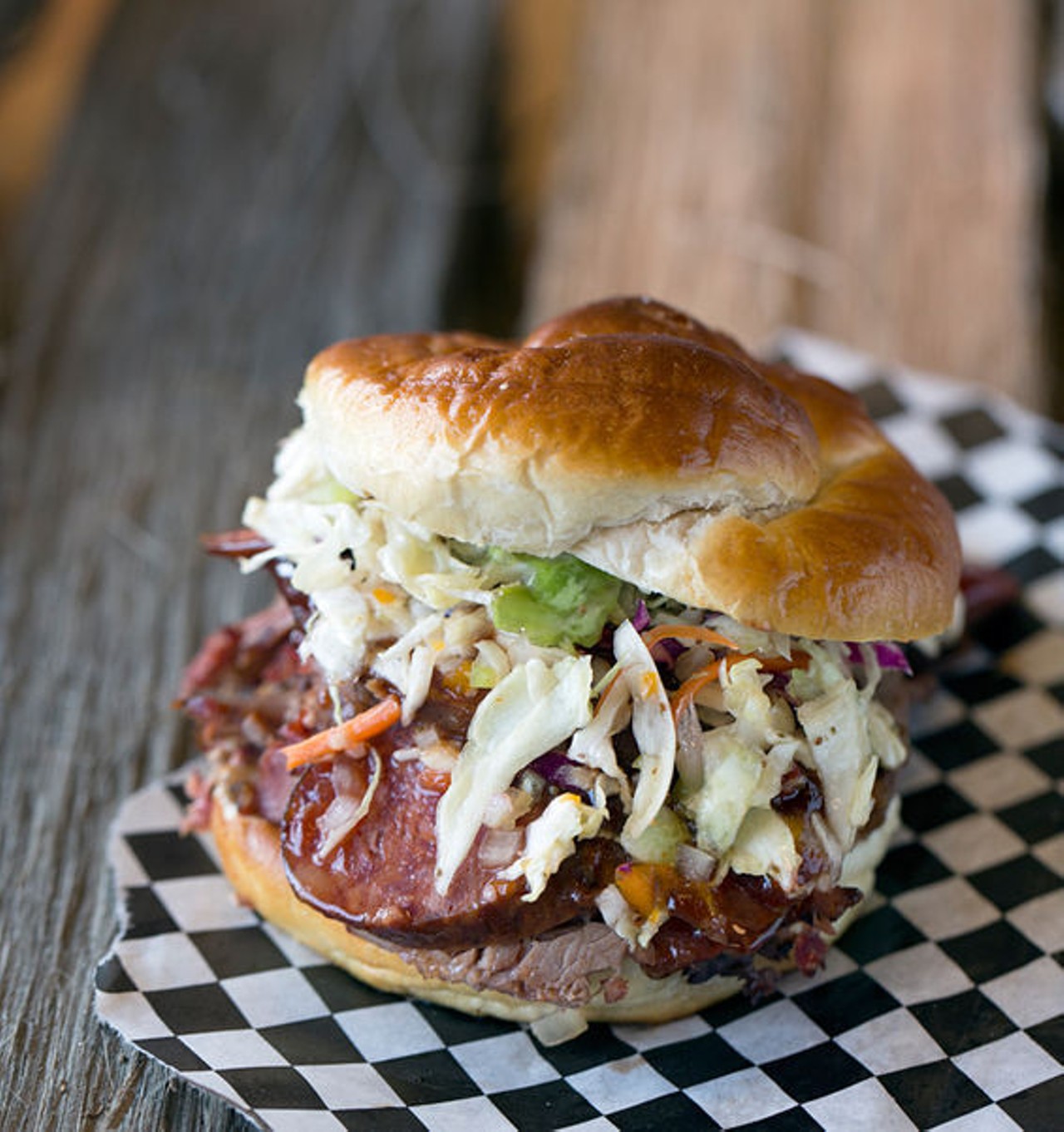 The "ASAP" is a beef-brisket sandwich slathered in spicy sauce and topped with hot link slices and crispy cole slaw. See more photos: Inside BBQ ASAP on Manchester.