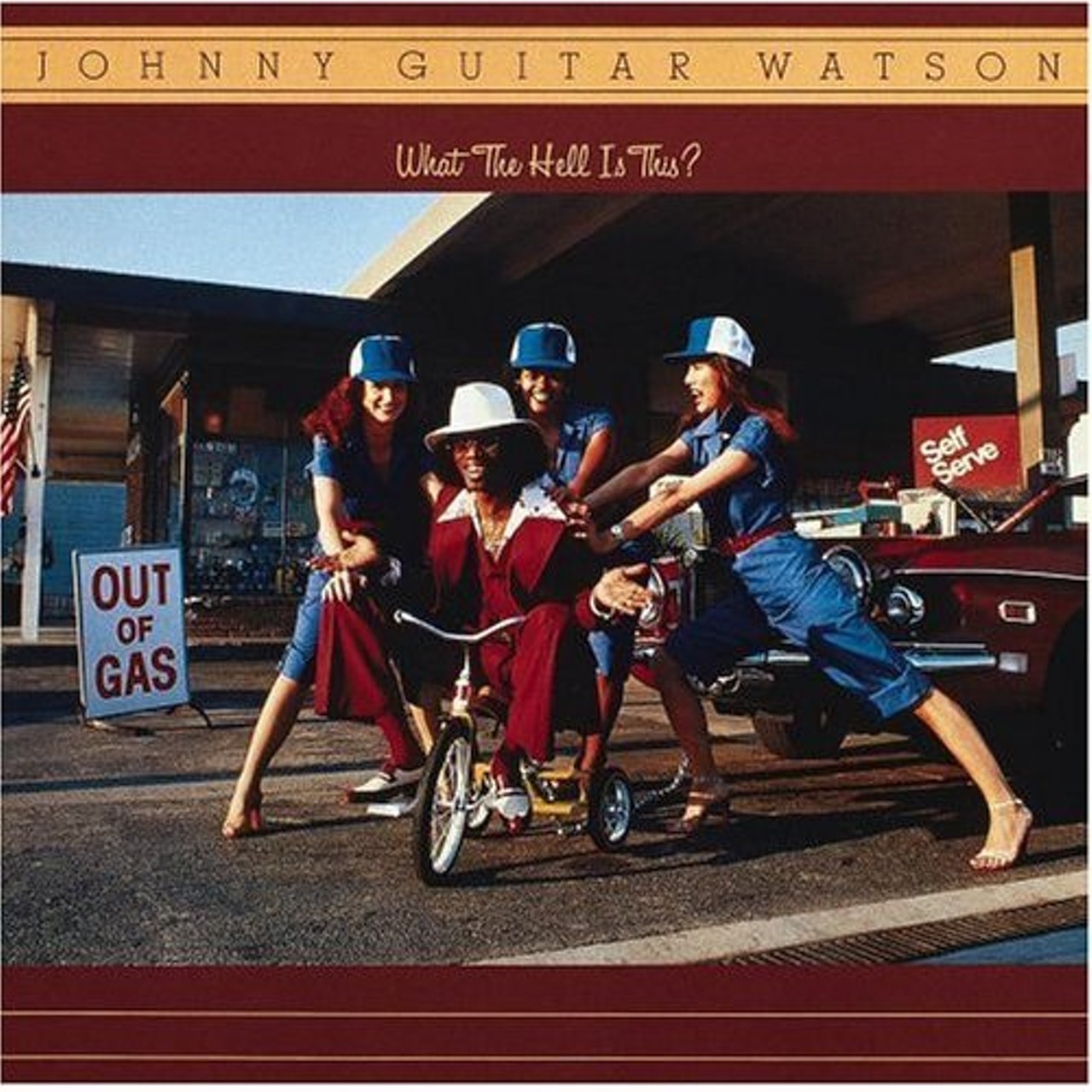 Johnny &ldquo;Guitar&rdquo; Watson: What the Hell is This? -- &hellip;Twice. It looks like his luck has improved if he can trade in his mama as a rickshaw driver for three hotties.