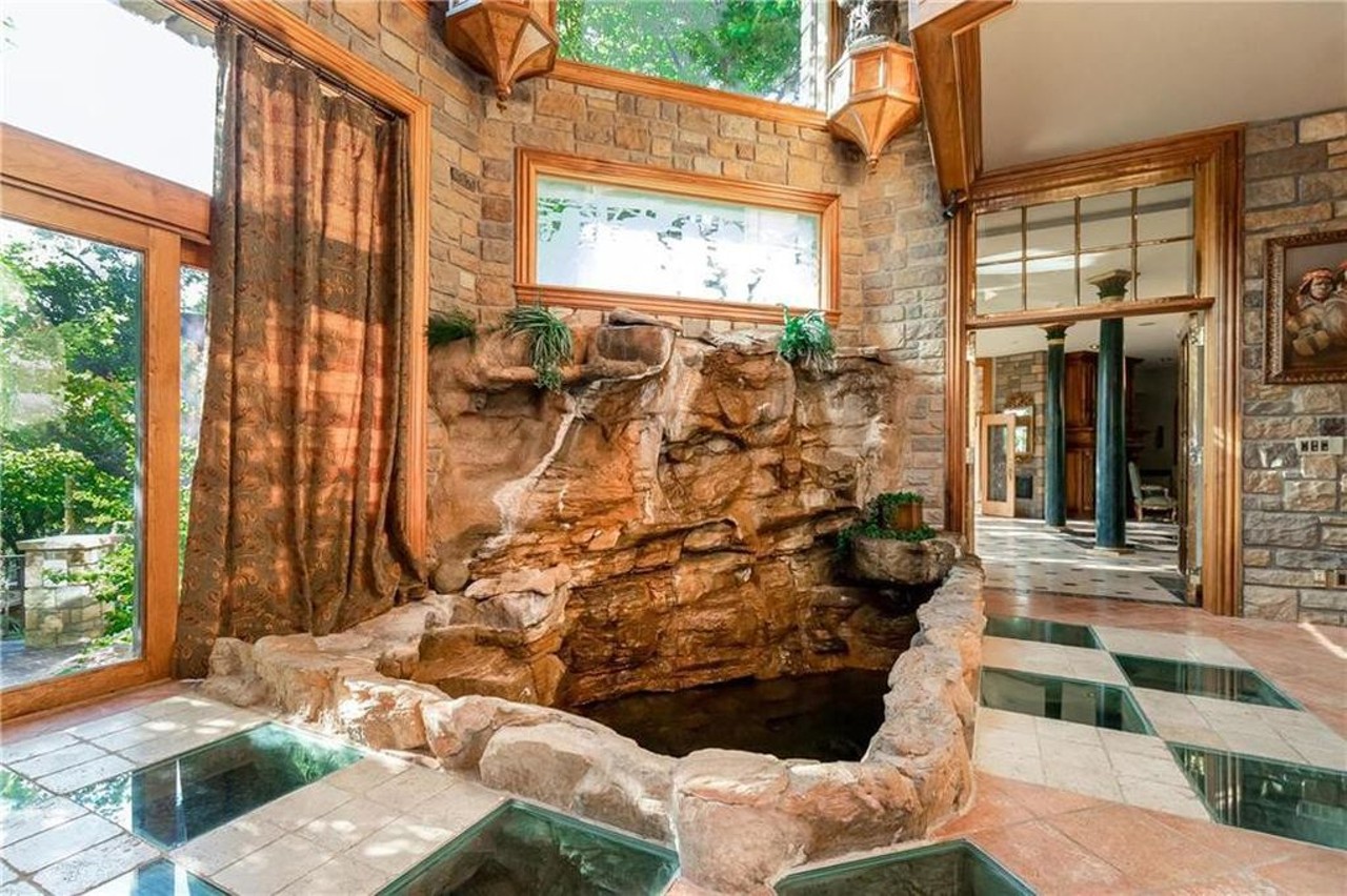 This Kansas City Mansion Has a Huge Waterfall and Playboy-Style Grotto