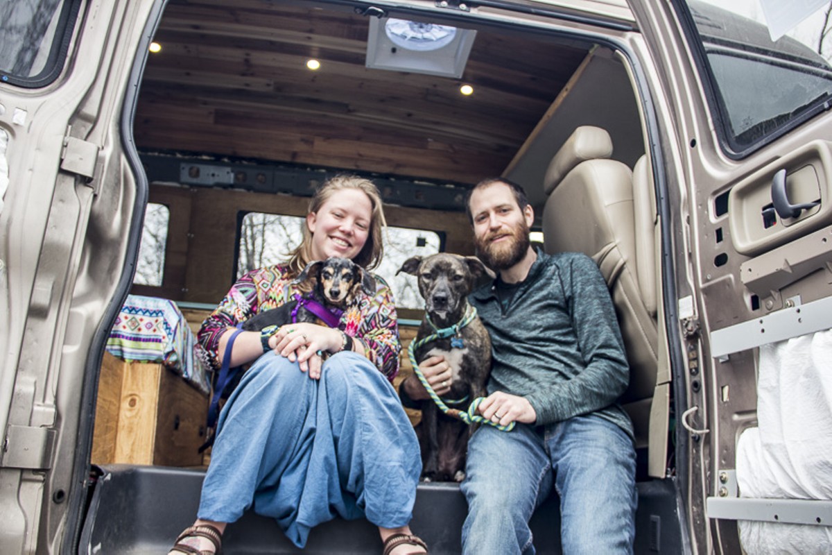 Jayme and John Serbell and their dogs Nymeria and Crow are hitting the road in a 1996 Chevy Express conversion van.