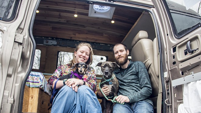 Jayme and John Serbell and their dogs Nymeria and Crow are hitting the road in a 1996 Chevy Express conversion van.