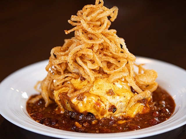 The slinger is made with a quarter-pound prime patty, hash, chili, American cheese and onion hay.