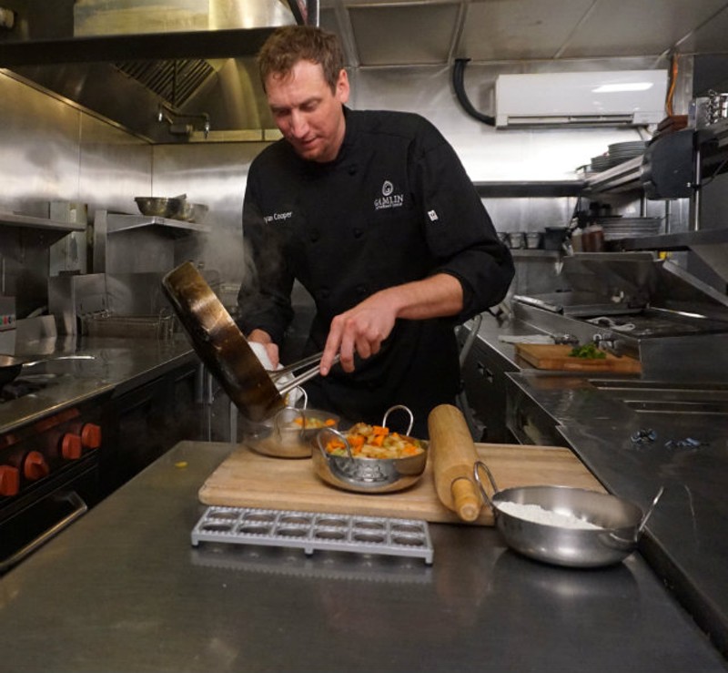 Chef Ryan Cooper of Gamlin Whiskey House prepares a dish for Late Nite Eats. - Photo courtesy of Gamlin Whiskey House.