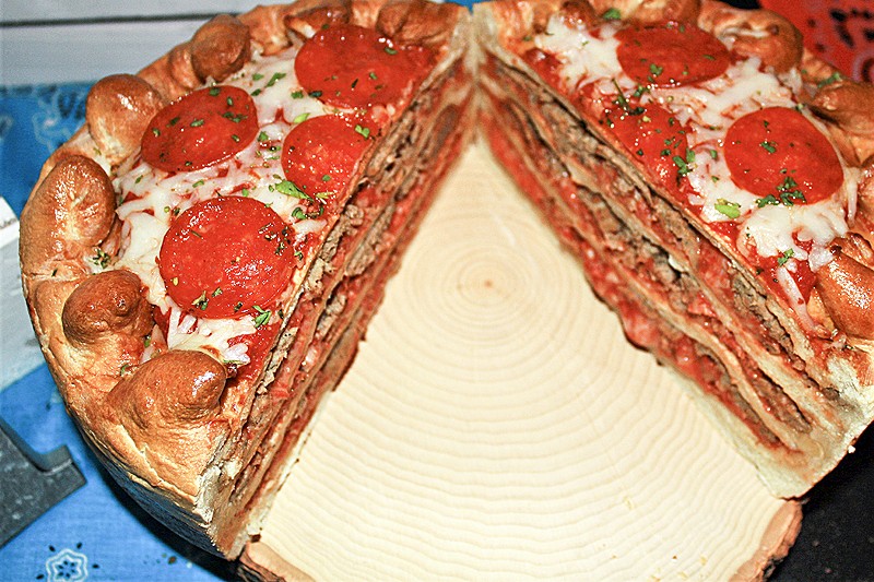 Say "cheese" for Bowlero's pizza cake. - PHOTO BY JESSY KINZEL