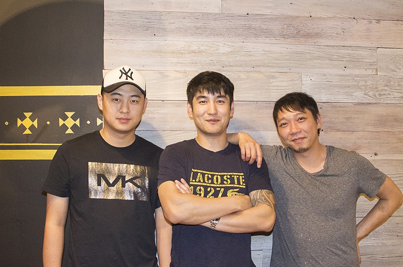Co-owners Yijun Chen (center) and Yong Liu (right) with Bing Bing Manager Xun Lee. - MABEL SUEN