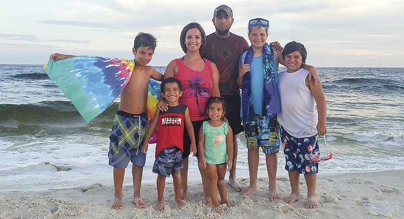 Garcia with his wife, Carleen, and five children. - COURTESY OF ALEX GARCIA