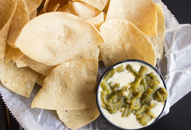 You can get your chips with a side of green chile queso. - MABEL SUEN