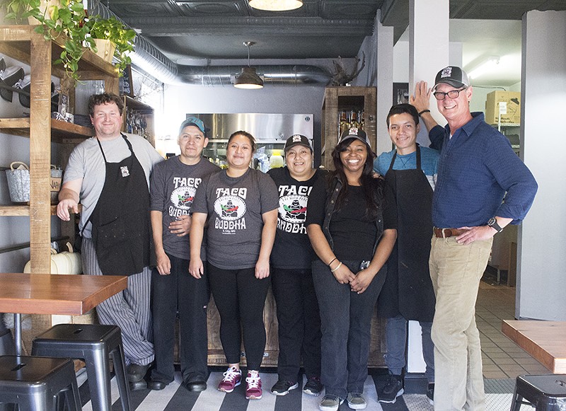 Chef Ben McArthur (far left) and owner Kurt Eller (far right) with Taco Buddha staff. - MABEL SUEN