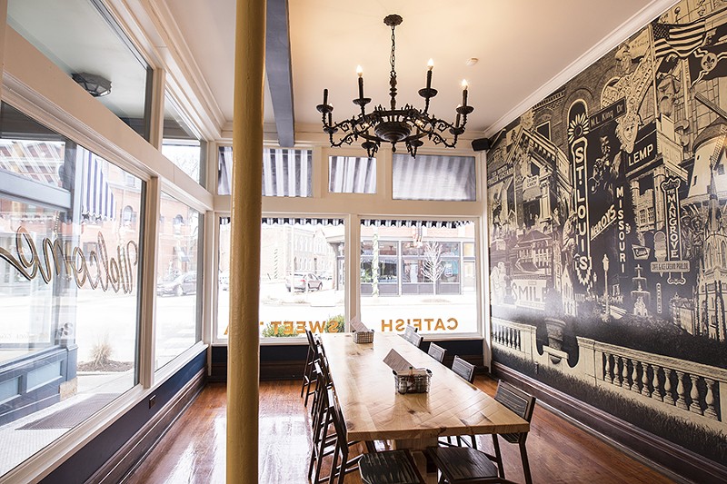 Seating options include a large communal table overlooking Manchester Avenue. - MABEL SUEN