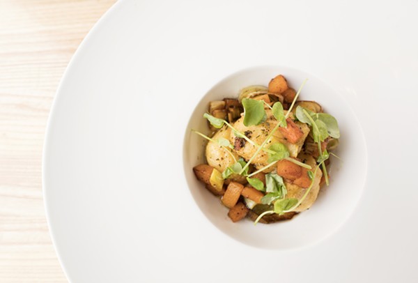 Ricotta gnudi are tossed with roasted squash, leeks and brown butter. - MABEL SUEN