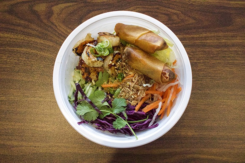 A noodle bowl with spring rolls. - CHERYL BAEHR