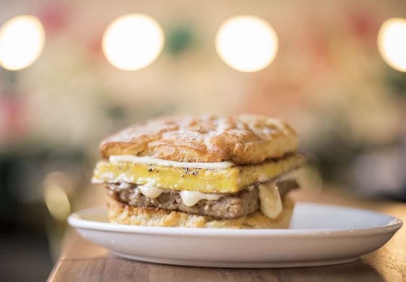 The "Biscuit Sand" is topped with white American cheese, egg and breakfast sausage. - MABEL SUEN