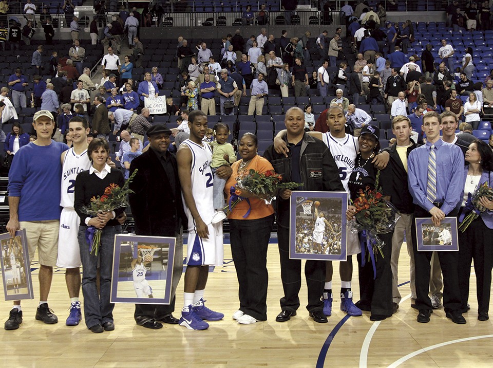 Liddell, center, stands with teammates on SLU's Senior Day in 2009. He chose to finish his career at the university rather than make a run at the NBA. - BILL BARRETT