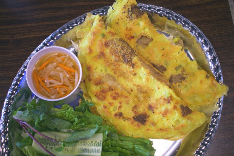 A Vietnamese-style crepe with bean sprouts, pork and chicken. - CHERYL BAEHR
