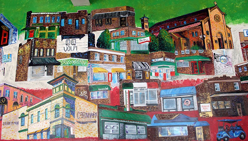 A mural shows off some of the Hill's highlights. - LEXIE MILLER