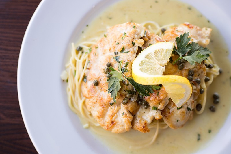 "Pollo Piccata" takes its flavor from capers, white wine, lemon and garlic sauce. - MABEL SUEN