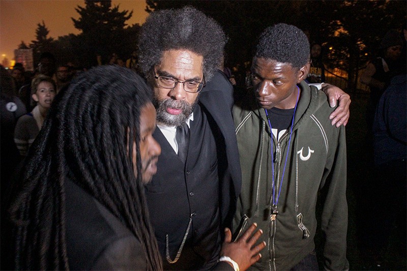 Josh Williams, right, with Cornel West during a protest in St. Louis in 2014. - DANNY WICENTOWSKI