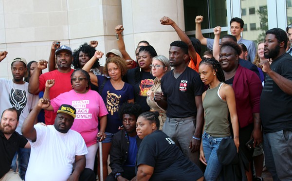 Supporters of Josh Williams pose for a photo after a press conference on August 3. - LEXIE MILLER