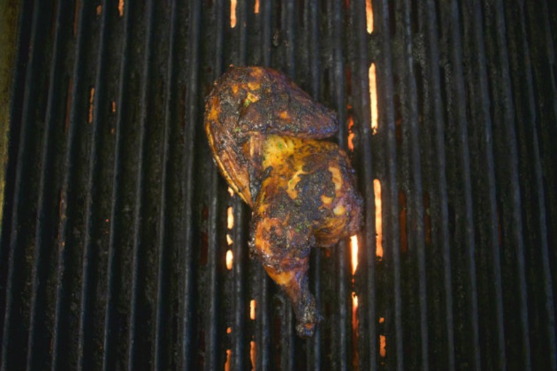 The "Judah's Jerk Entree" is a half chicken, smoked low and slow and finished on the grill. - CHERYL BAEHR