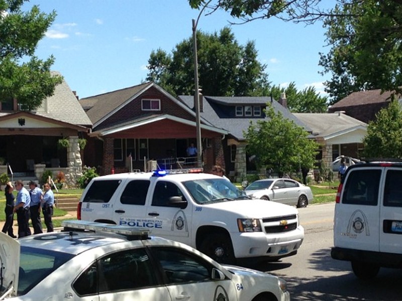 St. Louis Police work a crime scene in south city. - DOYLE MURPHY