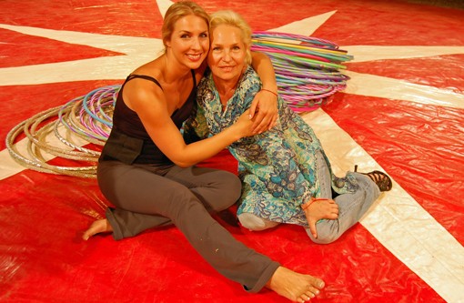 Aleysa Gulevich, left, and her mother, Nadezda Bilenko, herself a former performer, right before Gulevich broke the record. - Photo: Nick Lucchesi