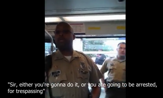 In Suitter's YouTube video, police ask him to exit the train. - YouTube