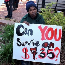 A St. Louis worker protests the minimum wage. - Krystyna Ninh for RFT
