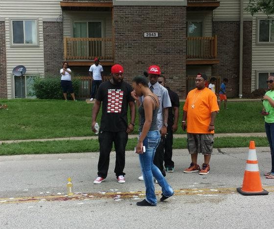 The scene on Canfield Drive where Brown was shot and killed August 9. - Jessica Lussenhop