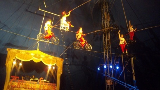 The Flying Wallendas make their way across the high wire.