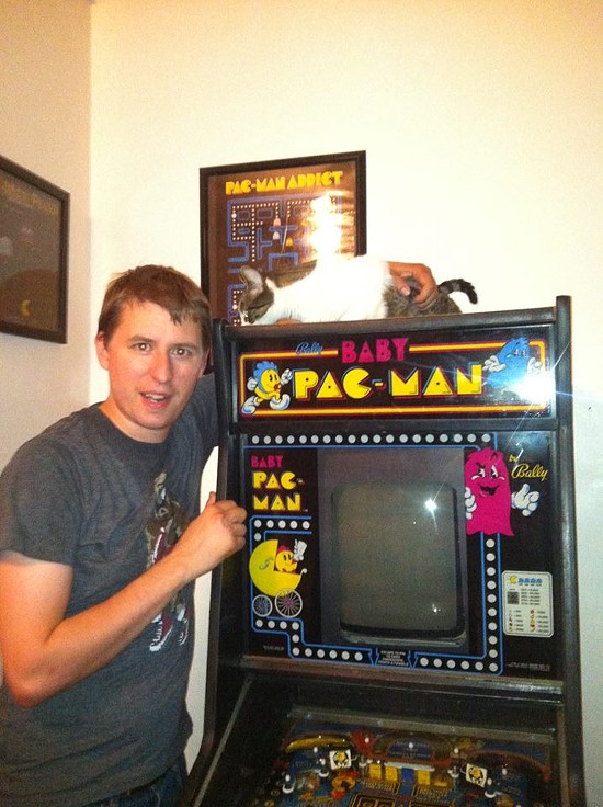 Chris Ward and his Baby Pac-Man machine. - Photos Courtesy of Chris Ward