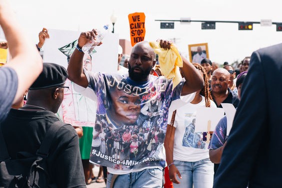 Michael Brown, Sr., Brown's father, marches in Ferguson.