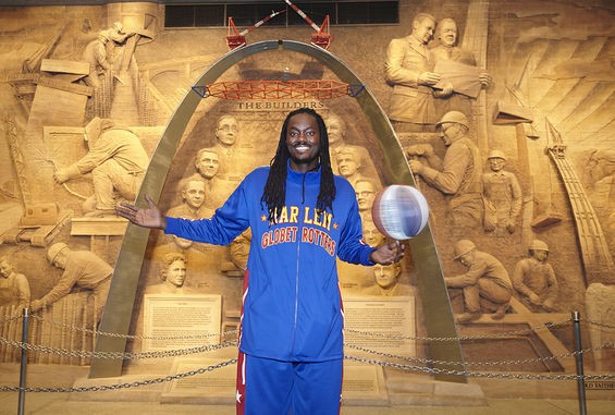 Slick Willie Shaw of the Harlem Globetrotters is pretty darn tall. Not quite as tall as the Gateway Arch, but tall. See more photos. - STEVE TRUESDELL